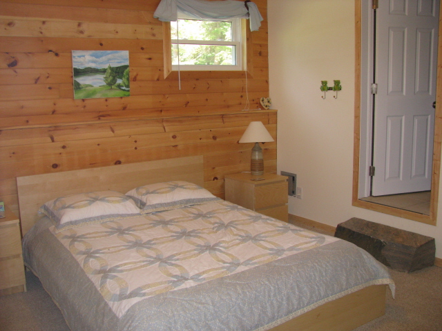 Buck Lake Cottage Rental #3-19~ Downstairs bedroom with queen bed and 3pc bathroom