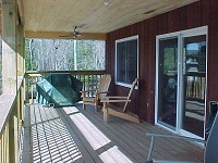 Buck Lake Cottage Rental 31~ Muskoka Chairs on Covered Verandah